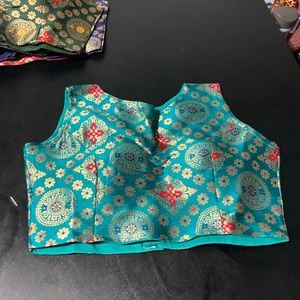 The banarasi blouses can match on any saree fits upto 42 size